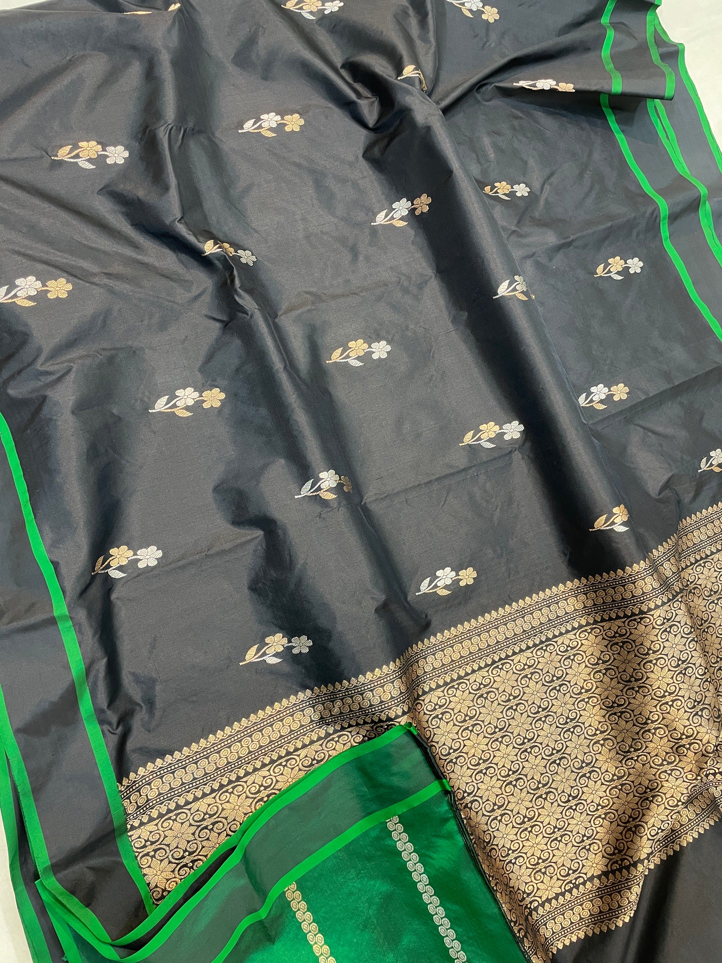 Elegant Black Handloom Saree with Zari Floral Motifs & Green Border & Blouse